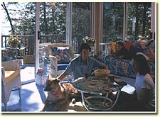 The comfortable sunroom overlooking Lake Muskoka